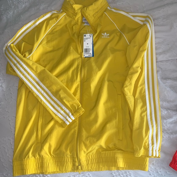 adidas sst windbreaker yellow